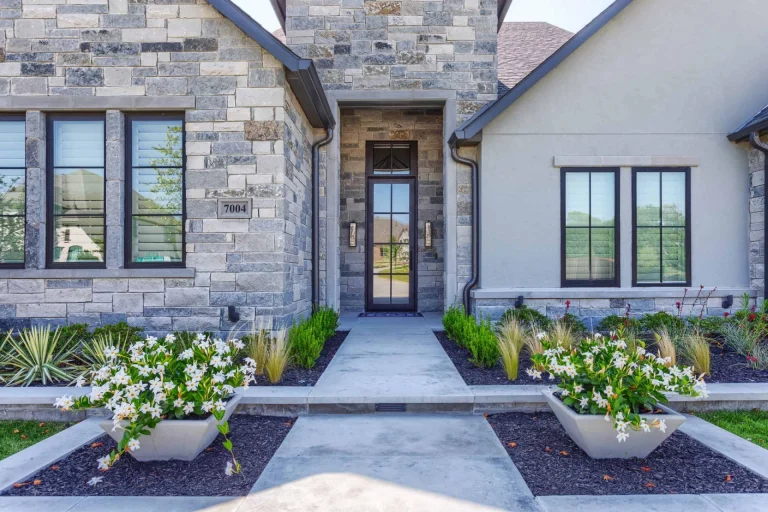 front-exterior-with-stone-and-concrete-pathway-scaled