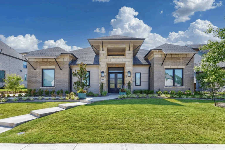 front-yard-of-house-with-stone-and-brick-exterior-scaled